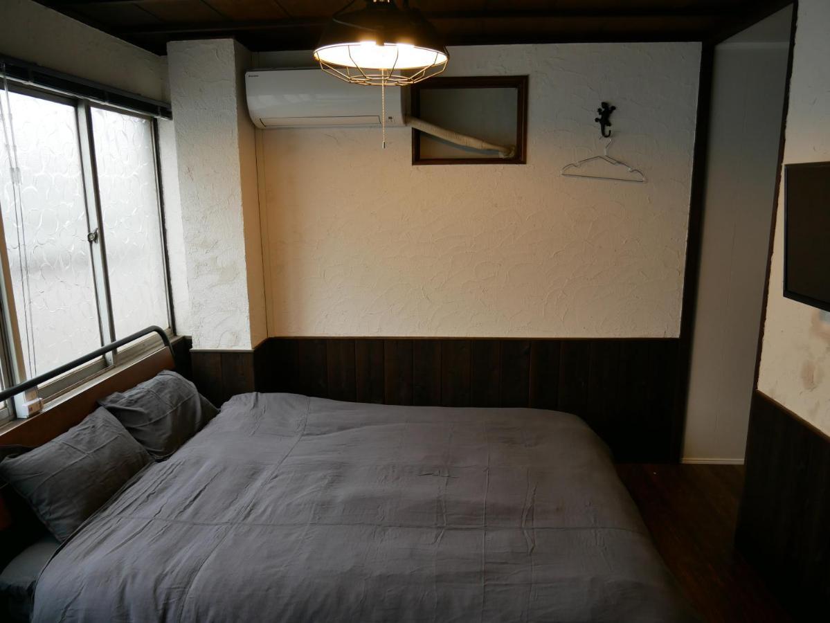 Guest House Kishinosato Osaka Bagian luar foto